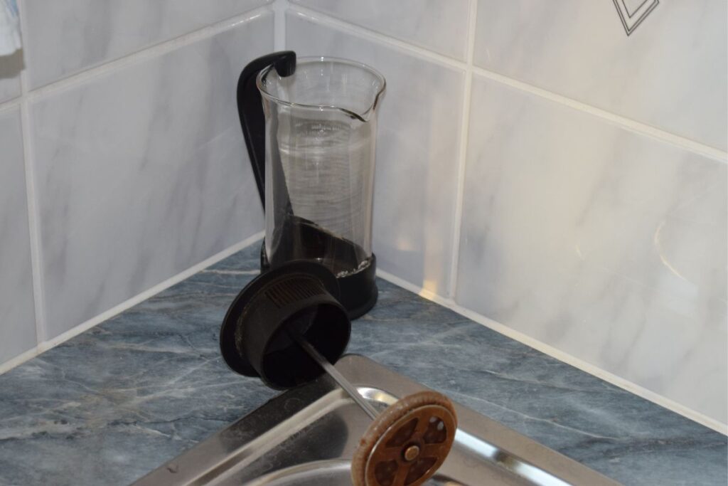 French press on a kitchen sink