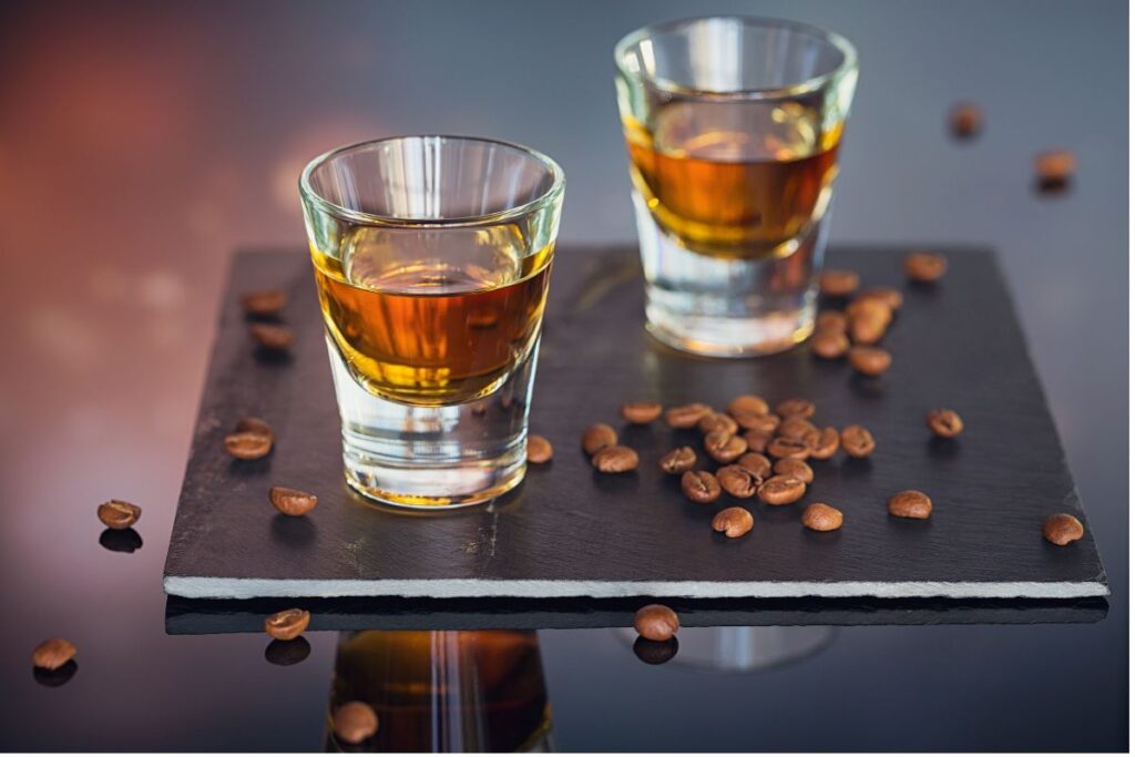 Shots of whiskey and coffee beans